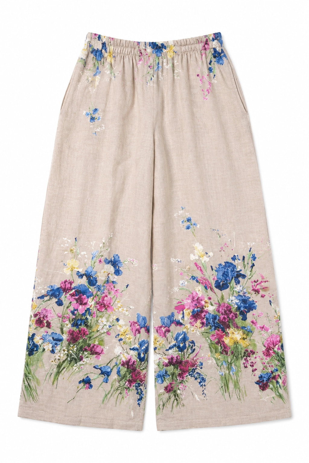A pair of wide-leg linen pants in beige, featuring colorful wildflower embroidery concentrated at the hem and around the elastic waistband, shown against a plain white background.
