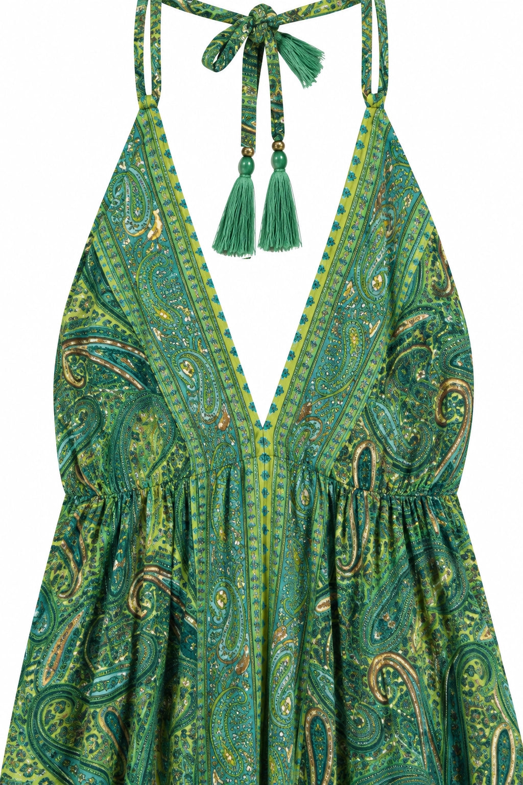 Green halter dress with a paisley pattern, featuring a deep V-neckline, tie straps, and tassel details, shown against a plain white background.