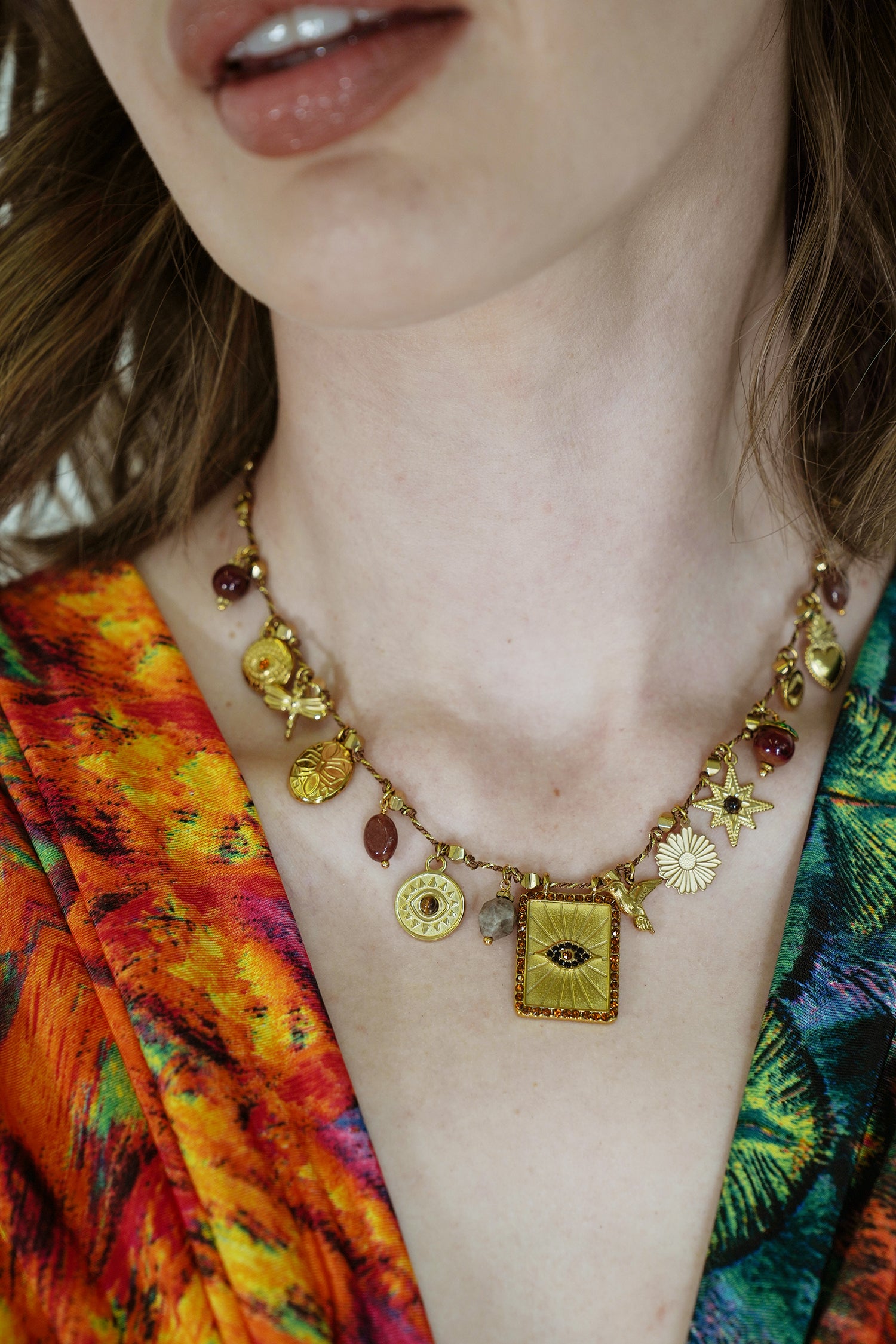 Gold and Rust Charm Necklace, a necklace from Something Pretty