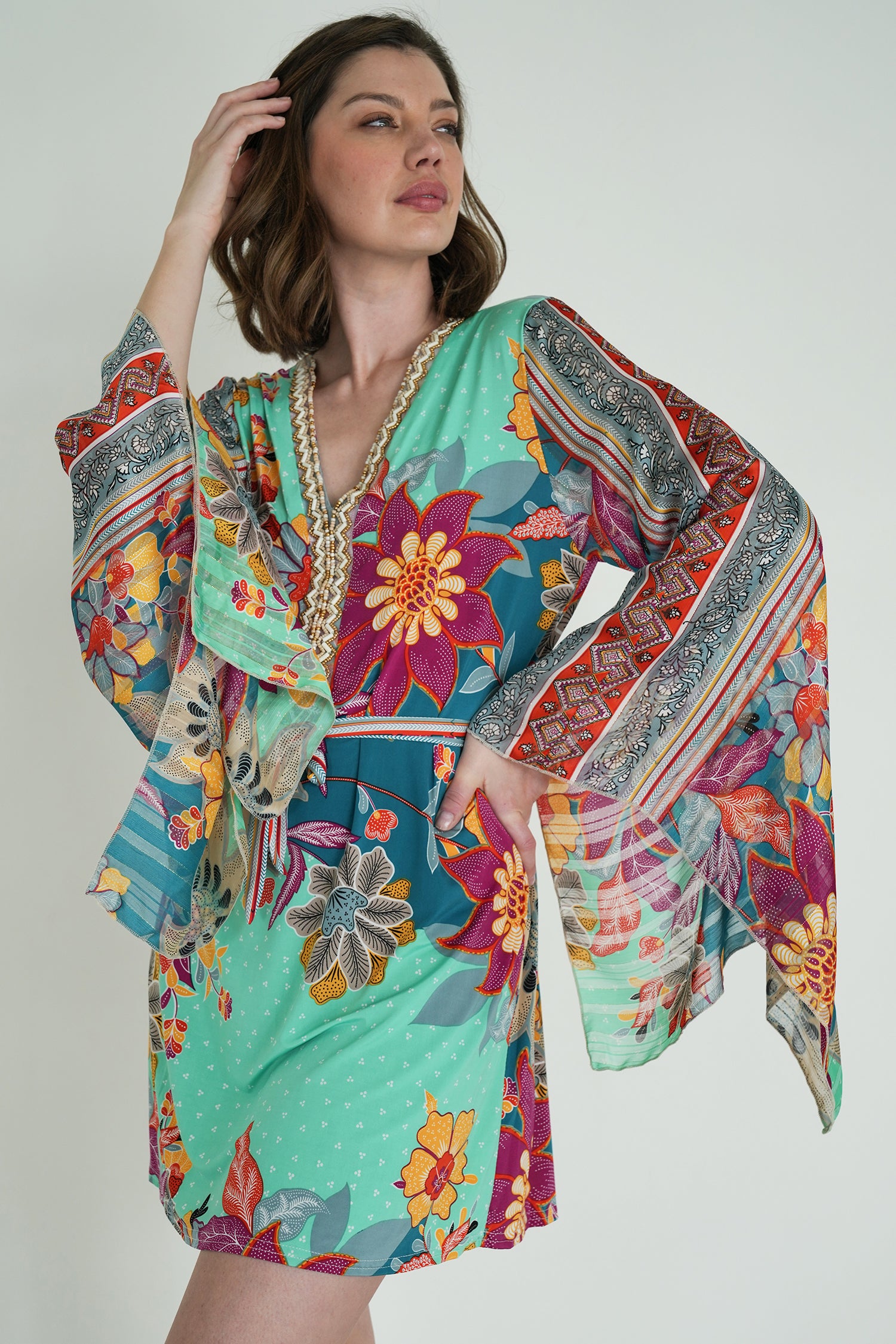 Elena Print St Tropez Tunic Dress, a green floral print boho tunic dress from Something Pretty