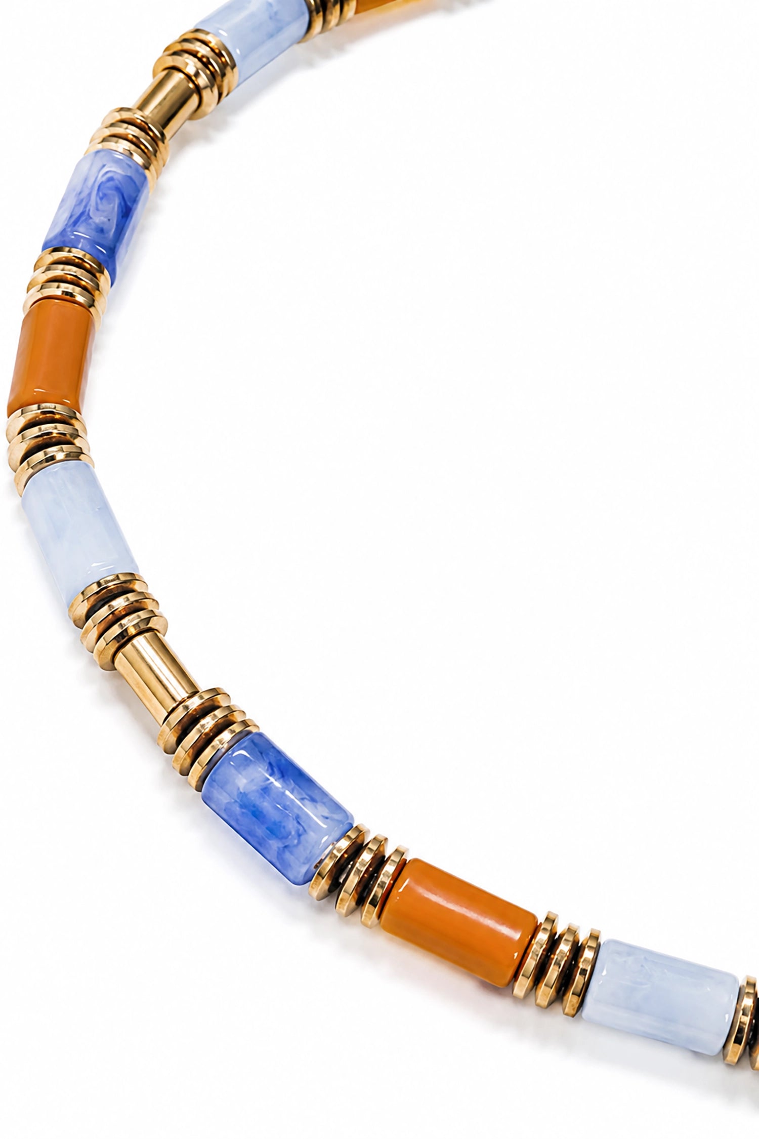 Necklace with multicolored beads and gold accents on a white background
