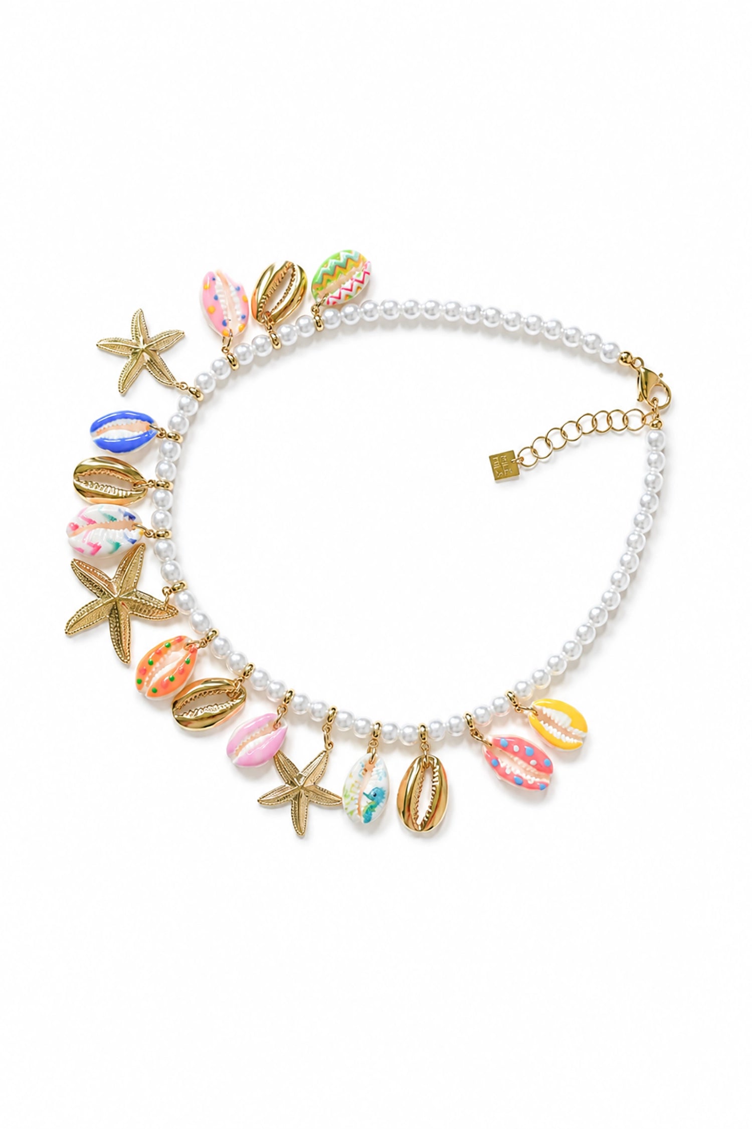 Beaded bracelet with starfish, shell, and beach ball charms on a white background