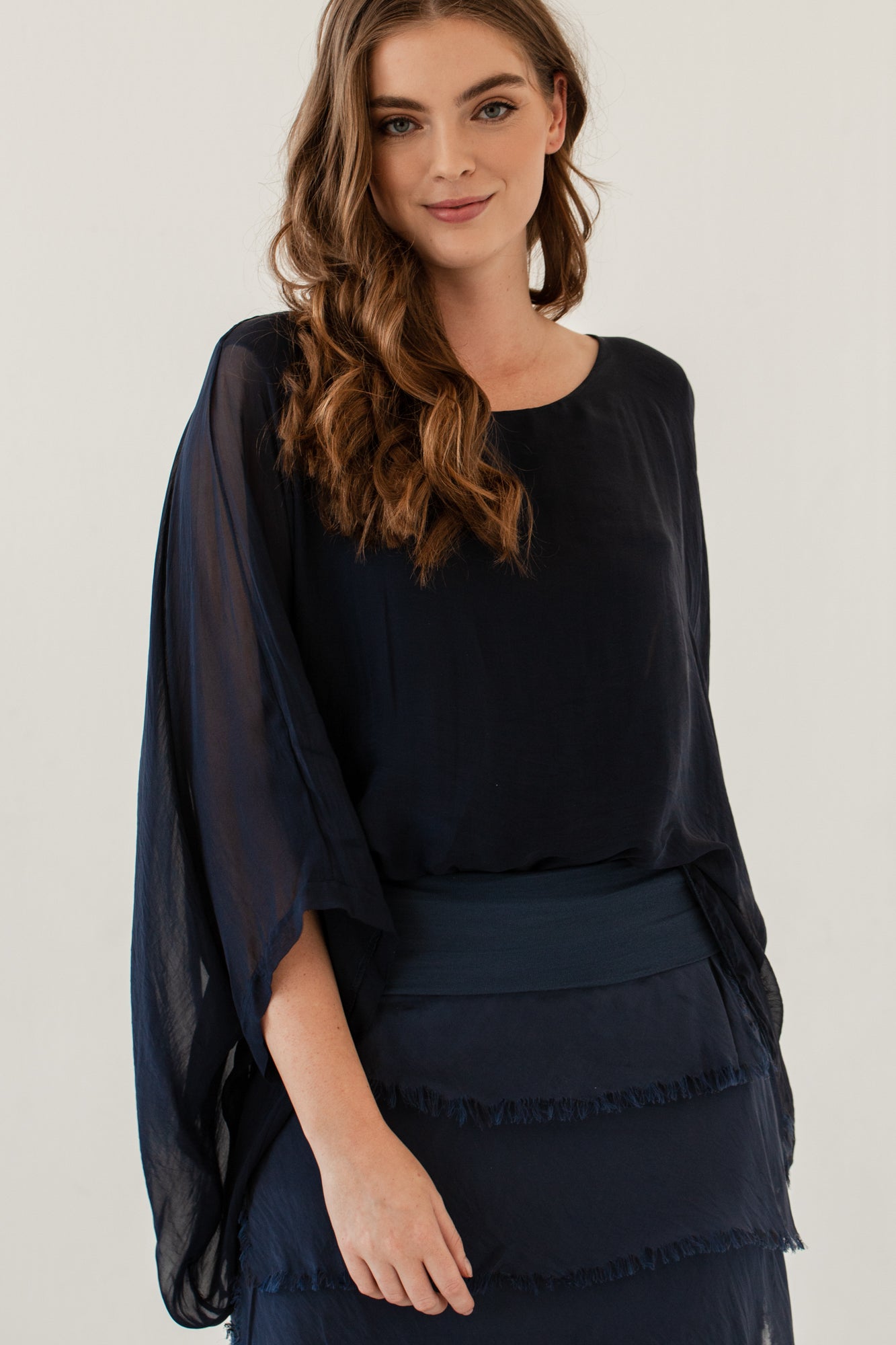 Silk Poncho, a silk poncho blouse from Something Pretty
