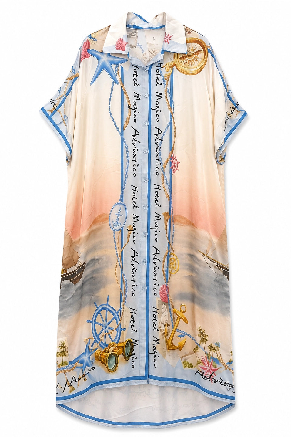 A short-sleeve button-up shirt dress featuring a nautical-themed print with a sunset beach scene, compass rose, anchor, ship's wheel, and script text on a white background.