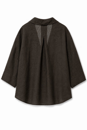 A dark brown textured linen-blend top with a wide collar, three-quarter sleeves, and a split V-back design with sheer mesh panels, shown against a plain white background.