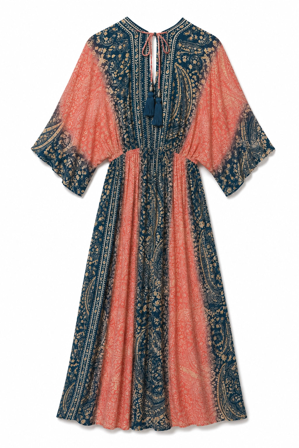 A bohemian-style maxi dress with a split design of coral pink and navy blue paisley patterns, featuring wide three-quarter sleeves and a tie-neck detail.