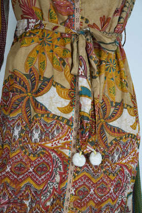 Close-up of a patterned dress with a focus on the fabric design.