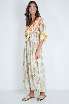 Woman wearing a floral dress with a white background