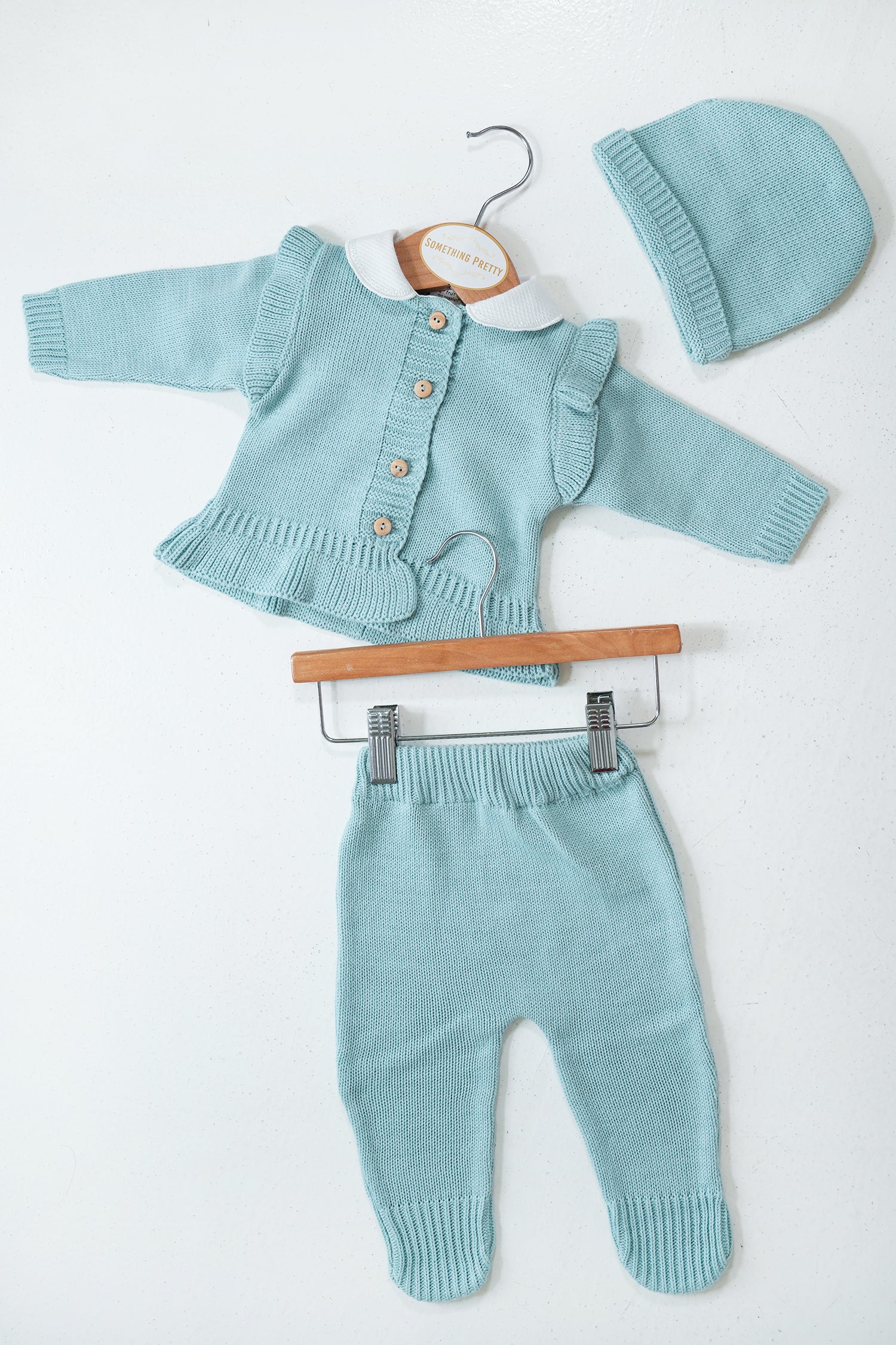 Sage Sophie Knit Set baby outfit flat lay with cardigan, pants and matching sage beanie