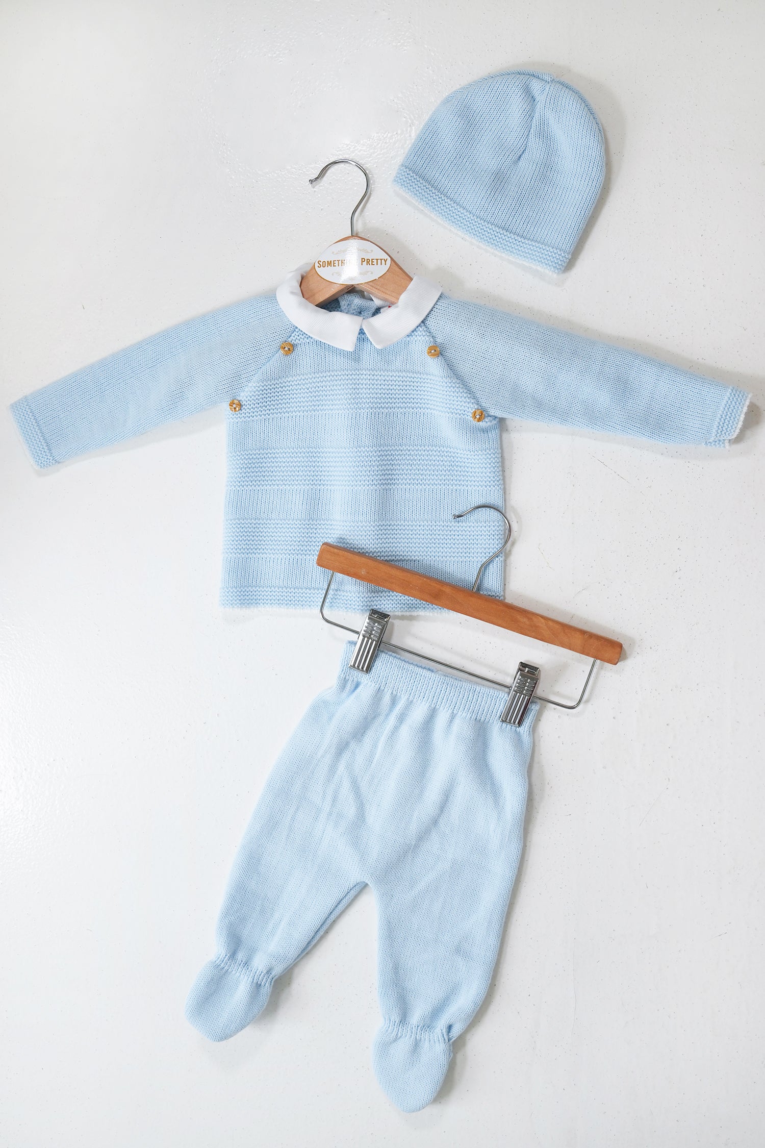 Blue Peter Knit Set baby outfit flat lay with cardigan, pants and matching blue beanie