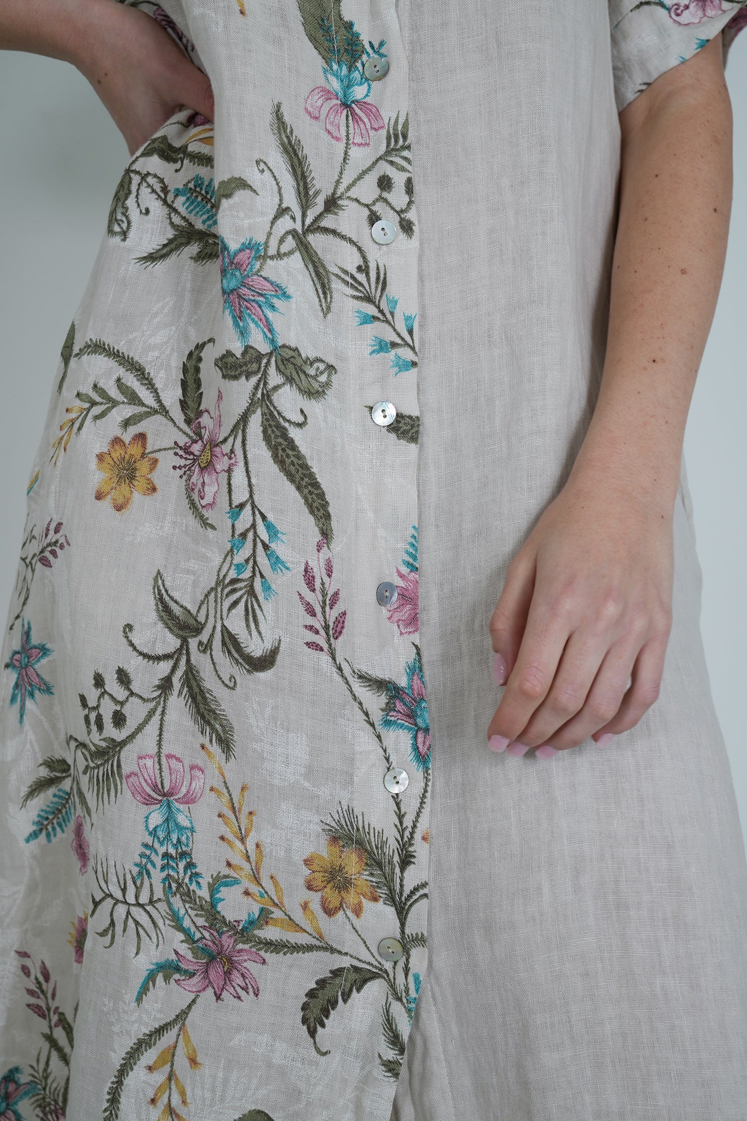 Floral embroidered dress with a plain background