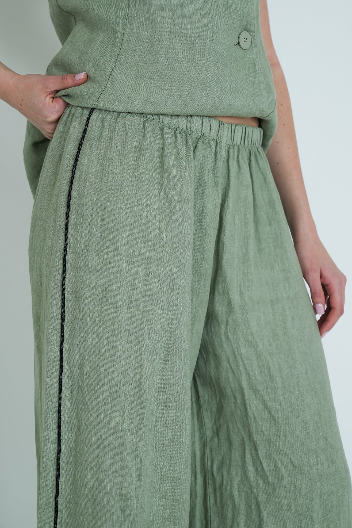 Green pants with a plain background