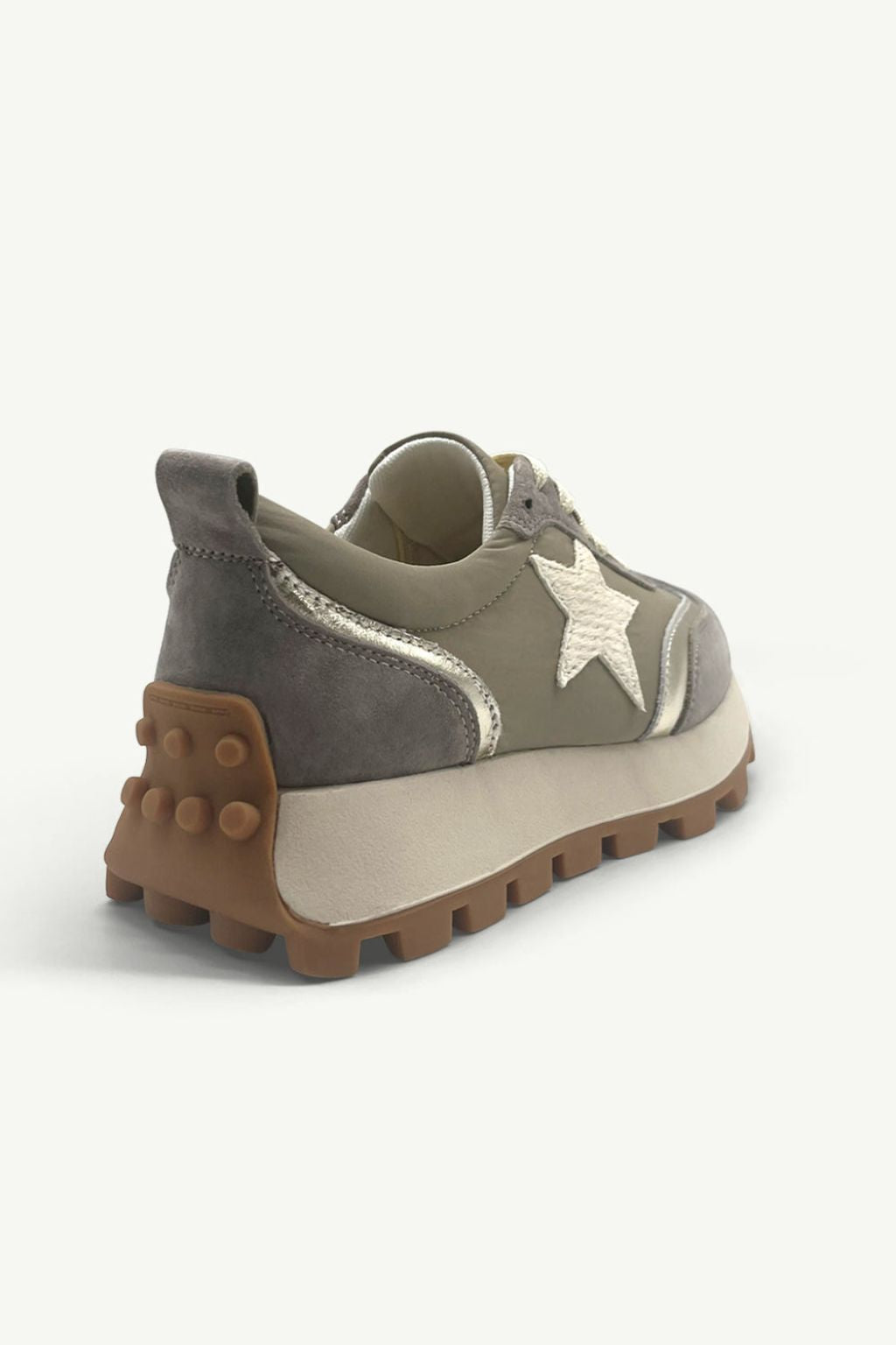 Sneaker with star design on a white background