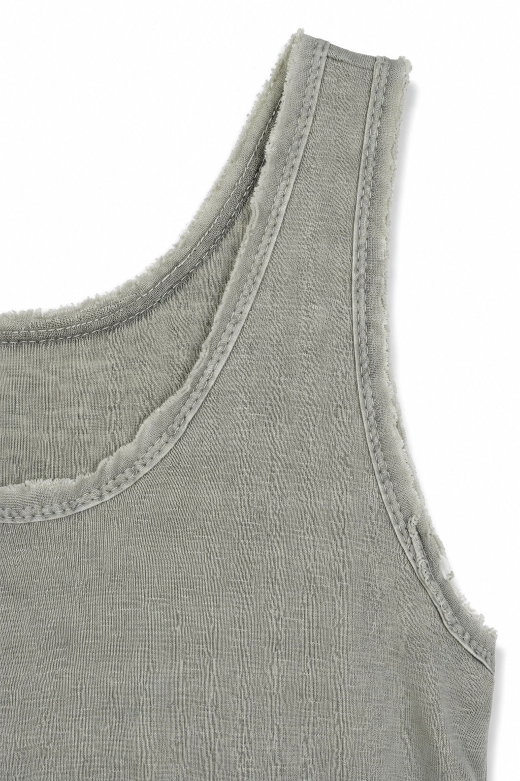 Close-up of a light gray ribbed knit tank top showing the shoulder, neckline, and raw frayed edges on a white background.