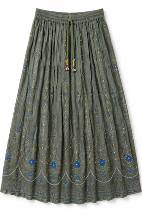 An olive green pleated skirt with blue and yellow embroidered patterns, featuring a drawstring waistband.