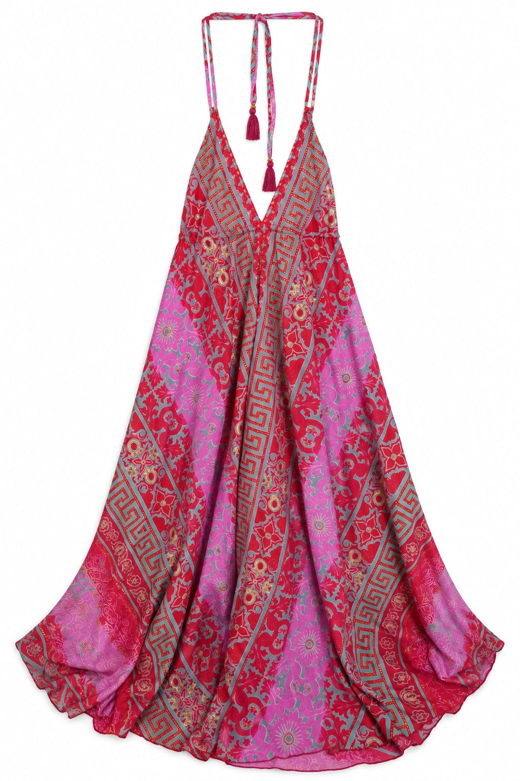 A pink and red halter maxi dress with a bohemian paisley and Greek key pattern, featuring tassel ties at the neckline, shown against a plain white background.