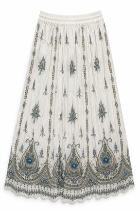 An off-white pleated midi skirt featuring intricate blue and gray embroidered paisley and floral patterns, with a scalloped lace hem.