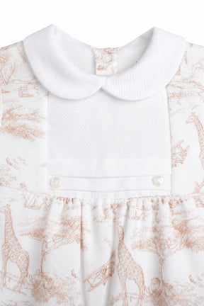 Close-up of a white dress with a floral pattern on a white background