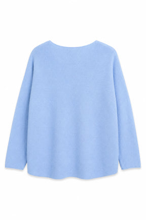 Light blue sweater on a white background