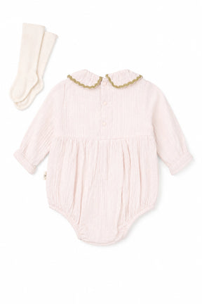 Pink baby romper with gold trim and matching socks on a white background
