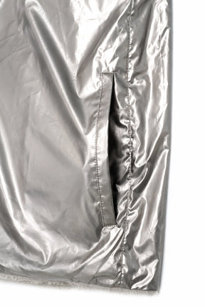 close up silver rain coat
