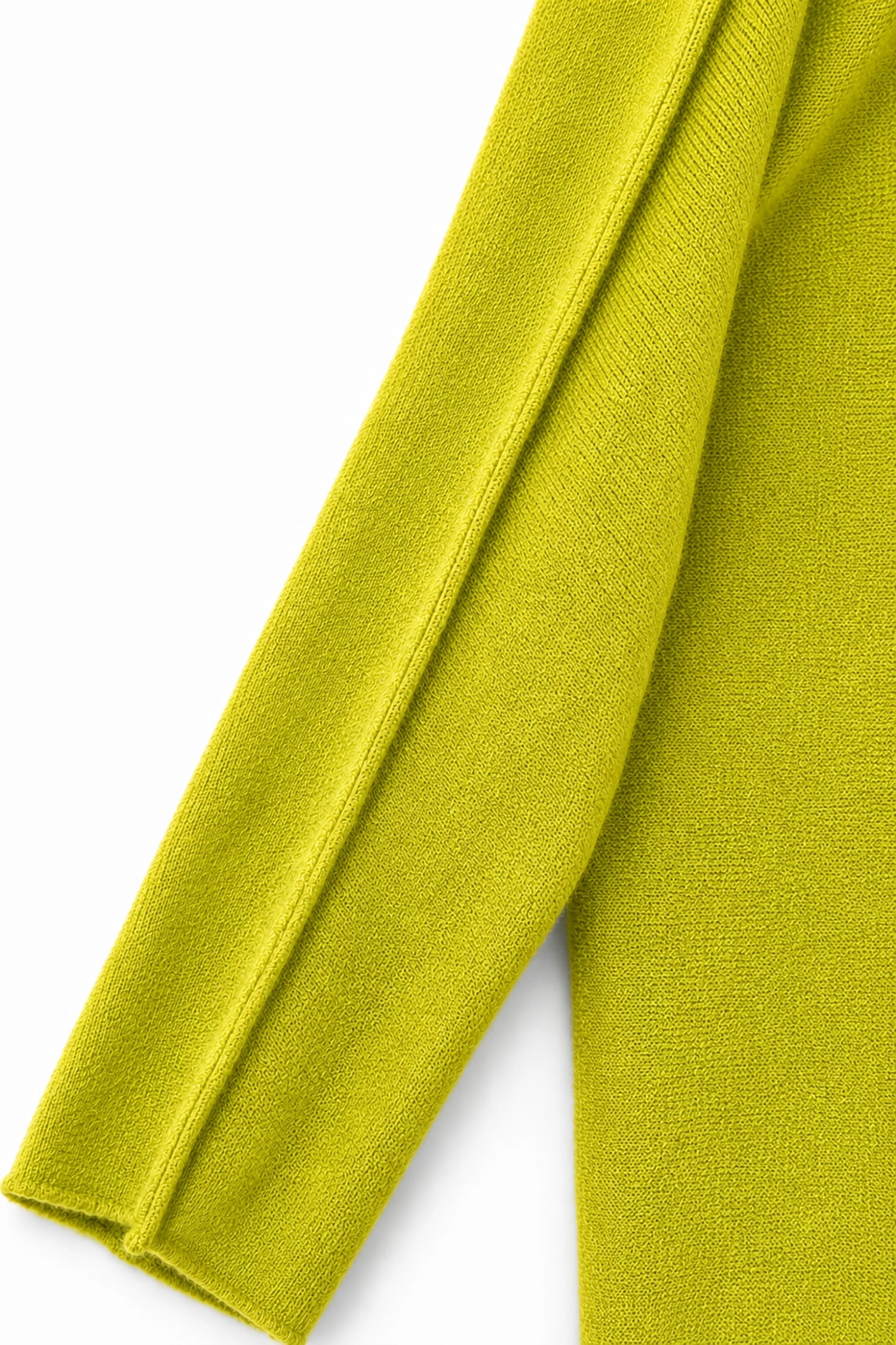 Close-up of a bright green fabric on a white background