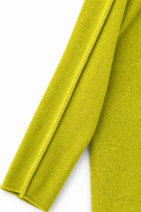 Close-up of a bright green fabric on a white background