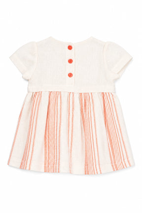 White dress with orange stripes and buttons on a white background