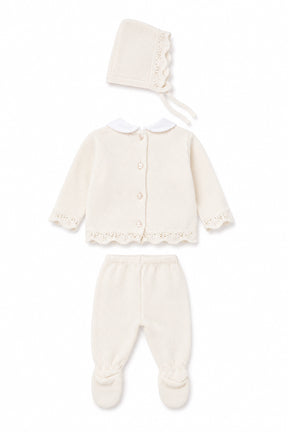 Baby outfit set with cardigan, pants, and hat on a white background