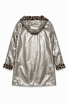 Silver raincoat with leopard print cuffs and hood on a white background