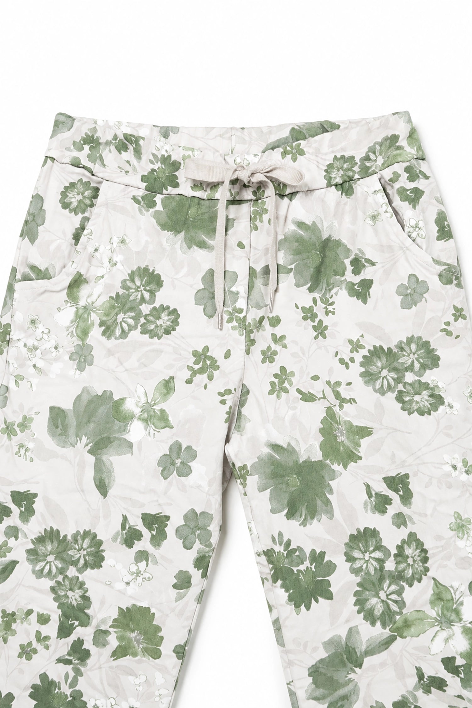 Floral-patterned pants on a white background