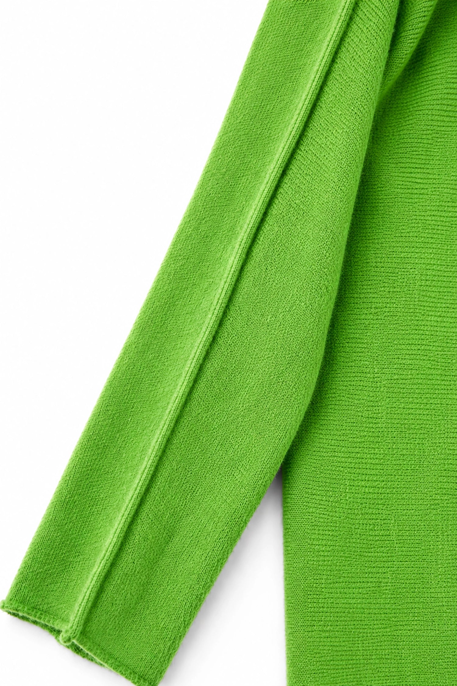 Close-up of green fabric on a white background