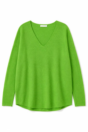 Green sweater on a white background