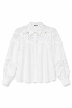 White blouse with lace details on a white background